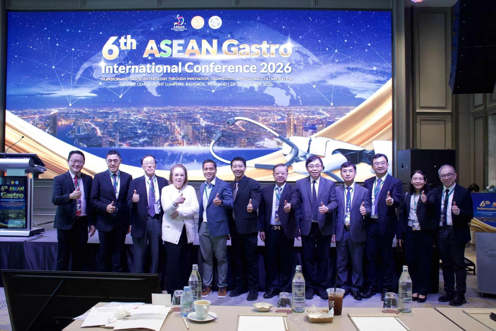 Delegates and speakers gathered on stage during the opening ceremony